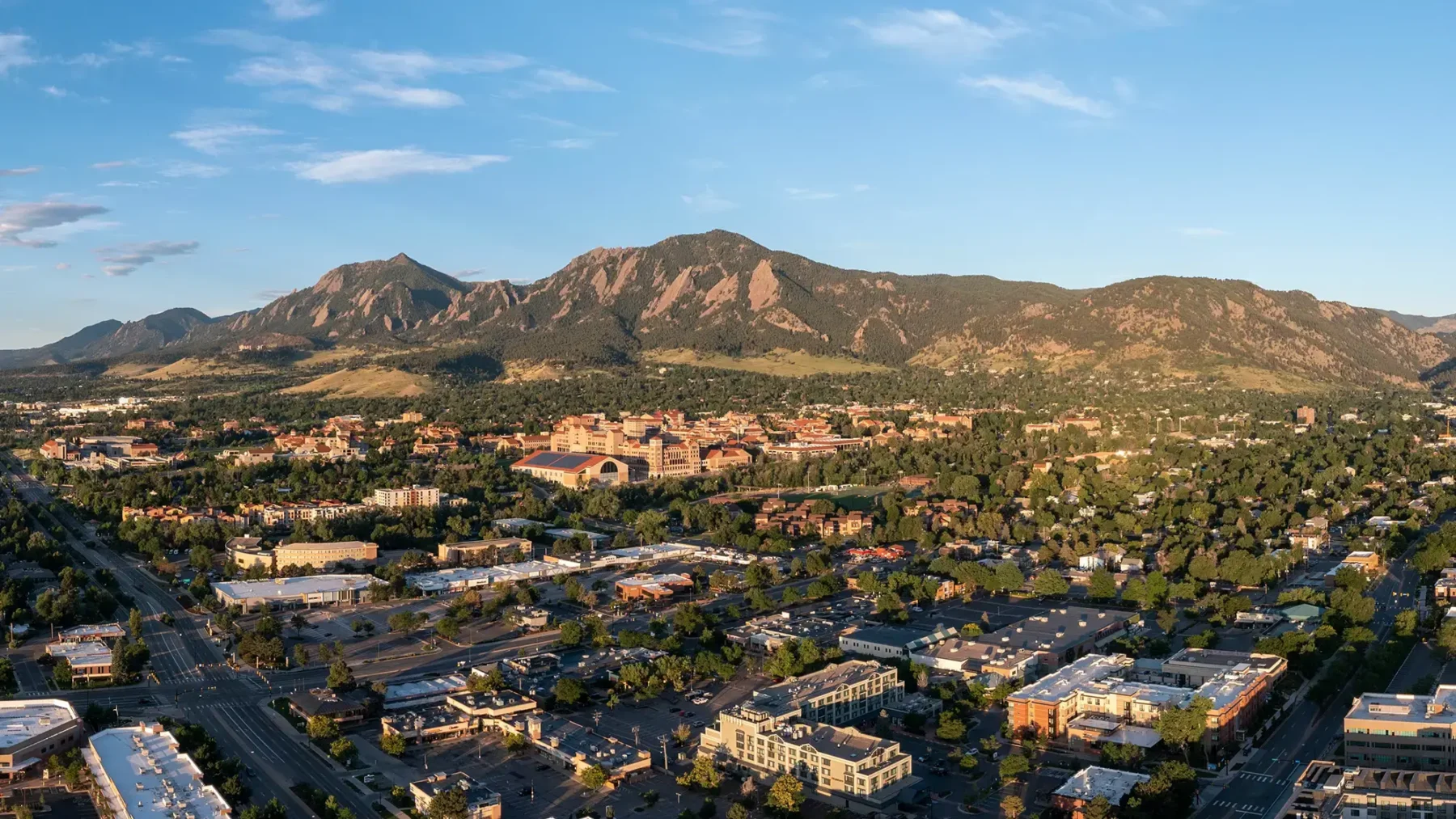 Aerial view of suburb with mountains in the distance